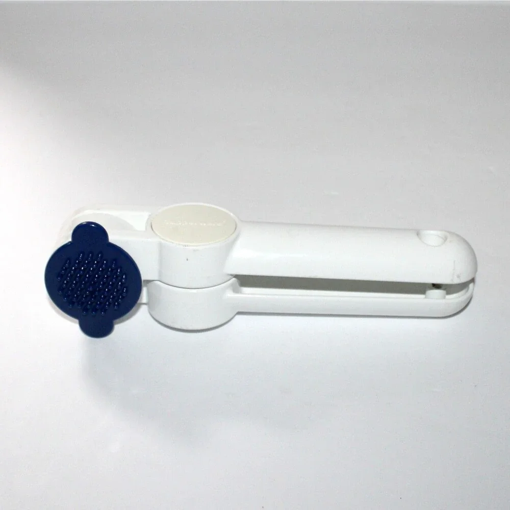 Tupperware Garlic Press with blue cleaning tool metal enamel white retro